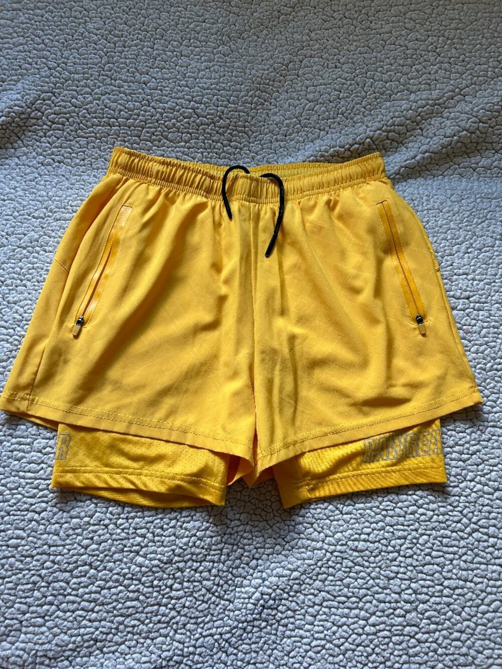 Rawgear -- yellow flowy running shorts, shorts underneath